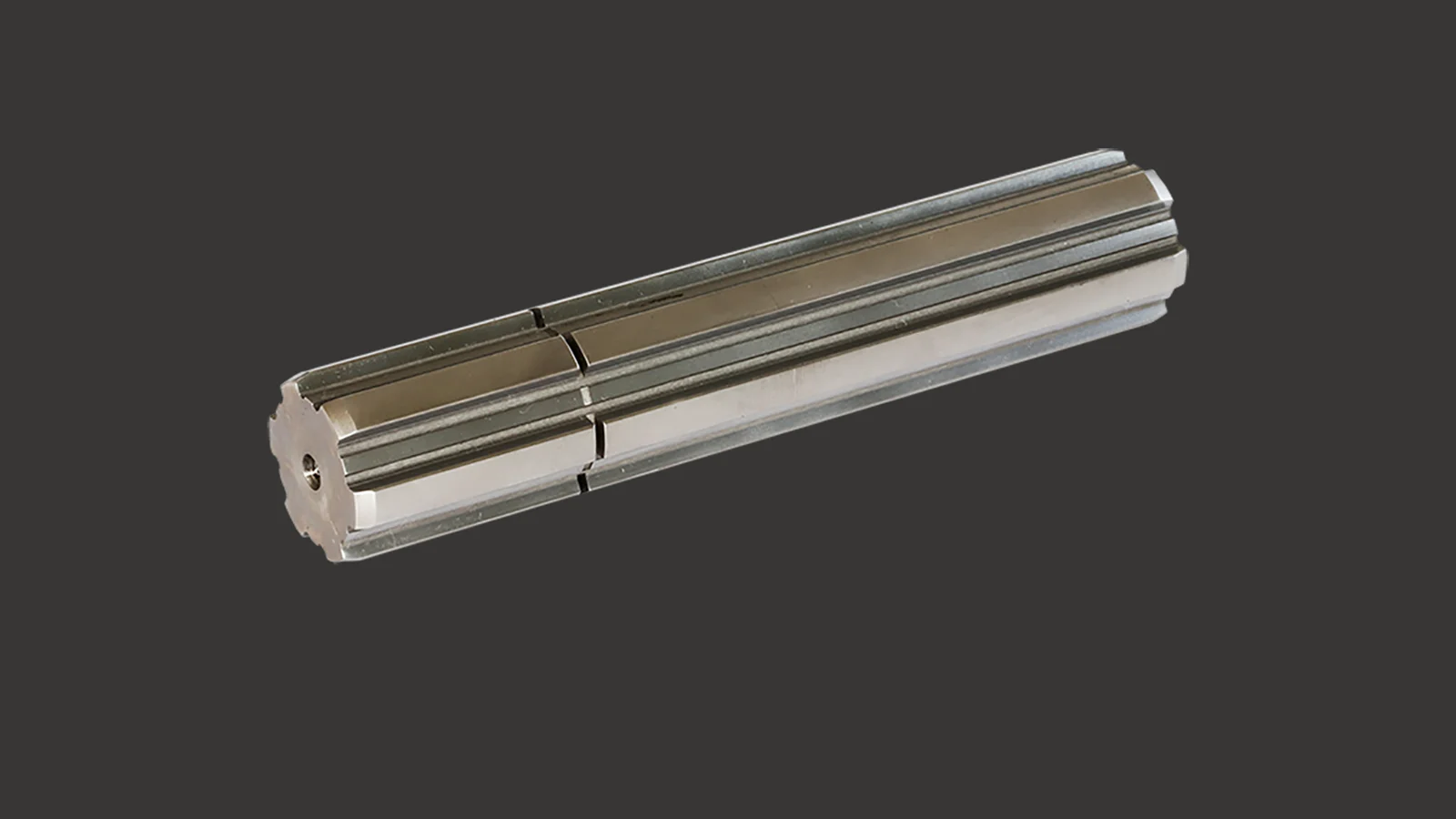 Cylindrical splined shaft made of steel with longitudinal grooves running along the entire length of the shaft