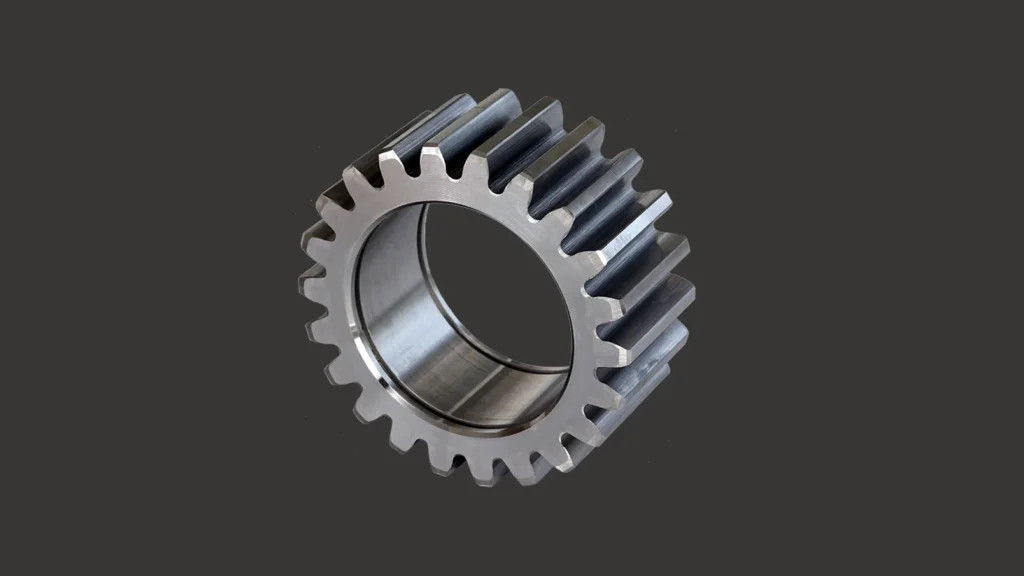 Cylindrical steel spur gear with straight teeth and a large central bore